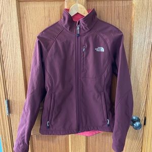 Women’s North Face zip up jacket.